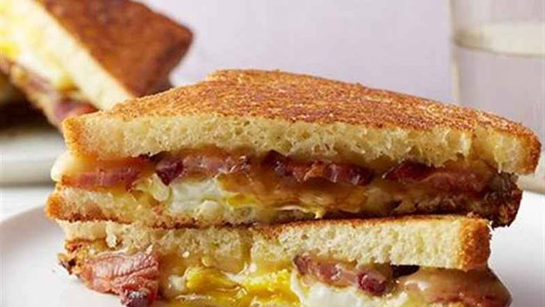 Grilled Trio Cheese & Fried Eggs Sandwich
